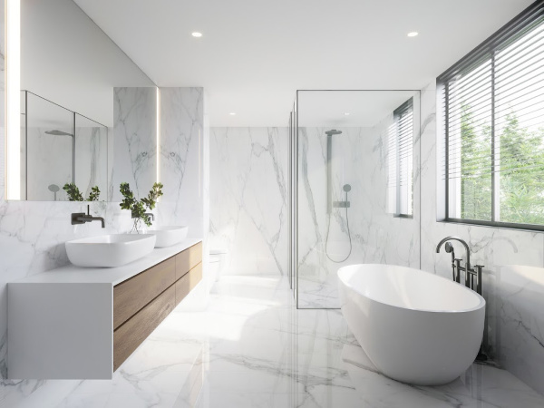 Remodeled designer bathroom with white quartz